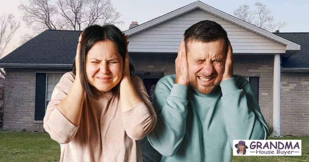 Couple covering their ears in front of a Texas home, symbolizing the stress of foreclosure and the need for urgent housing solutions